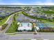 Aerial view of community pool, tennis courts, basketball court, and playground with lush landscaping at 6708 162Nd E Pl, Parrish, FL 34219