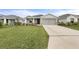 Nice home with a driveway and landscaped front yard at 6708 162Nd E Pl, Parrish, FL 34219