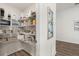 Well-organized pantry featuring ample shelving for food storage and household supplies at 6708 162Nd E Pl, Parrish, FL 34219