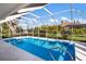 The large, screened pool is perfect for relaxation at 7204 18Th W Ave, Bradenton, FL 34209