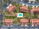 Aerial view of community townhomes with a shared pool, parking, and landscaped common areas at 7232 Cedar Hollow Cir # 7232, Bradenton, FL 34203