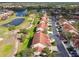 An aerial perspective of the properties near golf course with lush green landscape offering a premium leisure lifestyle at 7232 Cedar Hollow Cir # 7232, Bradenton, FL 34203