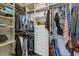 Walk-in closet features custom shelving, hanging racks, and storage solutions at 7608 Teal Trce, Bradenton, FL 34203