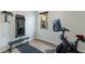 Bright exercise room with a peloton bike, weights, and luxury vinyl flooring at 7608 Teal Trce, Bradenton, FL 34203