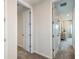 Open hallway with doorways leading to other rooms, highlighting the home's accessible layout at 8516 Golden Dawn Ct, Sarasota, FL 34241