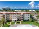 Exterior view of a multi-story beachfront condo building at 901 Beach Rd # 402, Sarasota, FL 34242