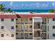 Exterior view of a condo building with beach view at 901 Beach Rd # 402, Sarasota, FL 34242