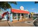 Charming Lobster Pot with red awning and window seating at 901 Beach Rd # 402, Sarasota, FL 34242