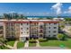 Low-rise beachfront condo building with well-maintained landscaping and access to the ocean at 901 Beach Rd # 402, Sarasota, FL 34242