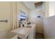 Functional laundry room with washer, dryer, and sink at 901 Beach Rd # 402, Sarasota, FL 34242