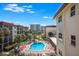 Aerial view of the community pool and surrounding buildings at 901 Beach Rd # 402, Sarasota, FL 34242