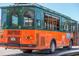 Colorful trolley with decorative windows, offering transportation services in the area at 901 Beach Rd # 402, Sarasota, FL 34242