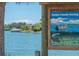 Informative sign about Florida Friendly Boating, waterfront scene with boat and clear water at 901 Beach Rd # 402, Sarasota, FL 34242