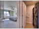 Bedroom featuring a view of a washer and dryer and a glimpse of a nice bedroom at 10811 High Noon Trl, Parrish, FL 34219