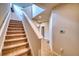 Hallway with staircase that leads to an upper floor at 10811 High Noon Trl, Parrish, FL 34219