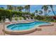 Inviting outdoor hot tub surrounded by lush landscaping at 1105 Gulf Of Mexico Dr # 603, Longboat Key, FL 34228