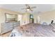 Bedroom with dresser, TV, and ceiling fan at 1122 42Nd E Ter, Bradenton, FL 34208