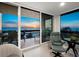 View from the balcony showcasing sunset and chairs for seating at 1145 Gulf Of Mexico Dr # 305, Longboat Key, FL 34228