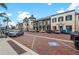 Attractive commercial street featuring various shops, parking, and sidewalks, with a well-designed and inviting atmosphere at 12510 Ghiberti Cir # 102, Venice, FL 34293