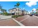 Beautiful street view with well-maintained buildings, sidewalks, and landscaping, creating a vibrant neighborhood feel at 12510 Ghiberti Cir # 102, Venice, FL 34293