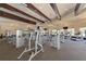 Well-equipped fitness center with modern exercise machines, weights, and ceiling fans for a great workout at 12510 Ghiberti Cir # 102, Venice, FL 34293