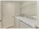 Laundry room featuring a washer and dryer at 12510 Ghiberti Cir # 102, Venice, FL 34293