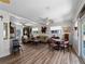 Open concept living room with neutral color palette and modern ceiling fans at 1627 Bayshore Dr, Englewood, FL 34223