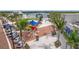 Outdoor community space with gathering space, shade sails, and colorful seating areas at 19715 Tortuga Cay Dr, Venice, FL 34293