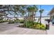 Exterior view of a dock with a wooden boardwalk and a waterfront seating area at 19715 Tortuga Cay Dr, Venice, FL 34293