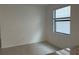 View of a breakfast nook area with a window and neutral tile flooring at 19715 Tortuga Cay Dr, Venice, FL 34293