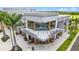 Contemporary designed retail building with corner windows and modern industrial details at 19715 Tortuga Cay Dr, Venice, FL 34293