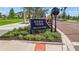 Downtown Wellen Park sign surrounded by landscaping and a brick street at 19715 Tortuga Cay Dr, Venice, FL 34293