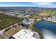 Aerial view of the condo complex showing proximity to a lake, golf course, and community amenities at 2001 Bal Harbor Blvd # 2301, Punta Gorda, FL 33950