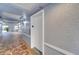 Well-lit hallway featuring an elevator, neutral color palette, and access to the outdoors at 2001 Bal Harbor Blvd # 2301, Punta Gorda, FL 33950