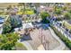 Aerial view of a community playground with slides, swings, and sunshades at 20078 Elegante Ct, Venice, FL 34293