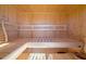 Interior of a wood sauna with built-in benches and slats, creating a relaxing retreat at 20078 Elegante Ct, Venice, FL 34293