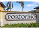 Portofino community sign with manicured landscaping at 20078 Elegante Ct, Venice, FL 34293