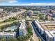 Overhead view of city apartments with lush landscaping near highway and downtown area at 201 W Laurel St # 209, Tampa, FL 33602