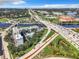 Aerial view of a city highway showing heavy traffic and nearby apartment complexes and river at 201 W Laurel St # 209, Tampa, FL 33602