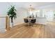 Dining area with modern table and chairs, and decorative wall panel at 201 W Laurel St # 209, Tampa, FL 33602