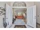 View through foyer into living room featuring neutral paint and an outdoor view at 2081 Timucua Trl, Nokomis, FL 34275