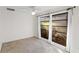 Bedroom featuring carpeted floors, neutral walls and large windows at 2118 Wells Av, Sarasota, FL 34232