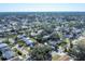 An aerial view of a property in a neighborhood with mature trees and close to a park at 2202 21St W St, Bradenton, FL 34205