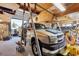 This garage features a truck inside, ample lighting, and an overhead support system at 2202 21St W St, Bradenton, FL 34205