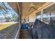 Inviting screened in porch with a ceiling fan and plenty of room for seating at 2202 21St W St, Bradenton, FL 34205