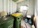 Shed interior providing ample storage room, well-lit with a convenient window for ventilation at 3236 Sumac Ter, Sarasota, FL 34237