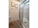 Bathroom shower featuring textured walls and an overhead light at 3236 Sumac Ter, Sarasota, FL 34237