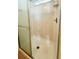 Shower stall with glass door and overhead lighting at 3236 Sumac Ter, Sarasota, FL 34237