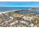 Wide aerial shot showcases a coastal town with waterways, bridges, and a mix of commercial and residential properties at 344 Monroe Dr, Sarasota, FL 34236