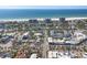 Stunning aerial view of beachfront property with ocean views and nearby amenities at 344 Monroe Dr, Sarasota, FL 34236